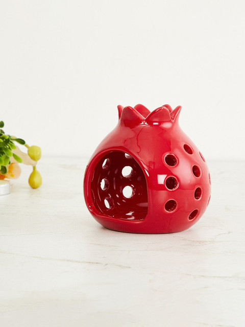 

Home Centre Red Pomegranate T-light Holder