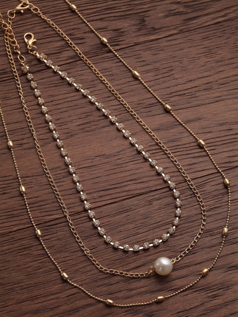 

Ferosh Gold-Toned & White Stones-Studded & Beaded Knot Jewellery Set