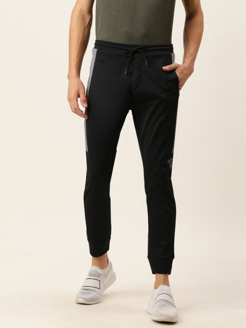 

Proline Active Men Black Solid Slim Fit High Waist Joggers With Side Stripes
