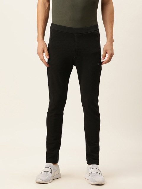 

Proline Active Men Black Self Design Mid-Rise Rapid-Dry Regular Track Pants