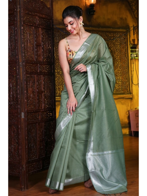 

Charukriti Green & Silver-Toned Zari Silk Blend Saree