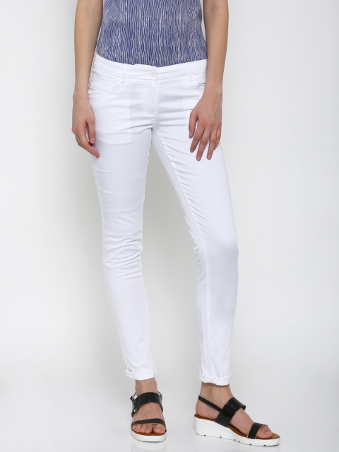 

Park Avenue Women White Solid Tapered Fit Formal Trousers
