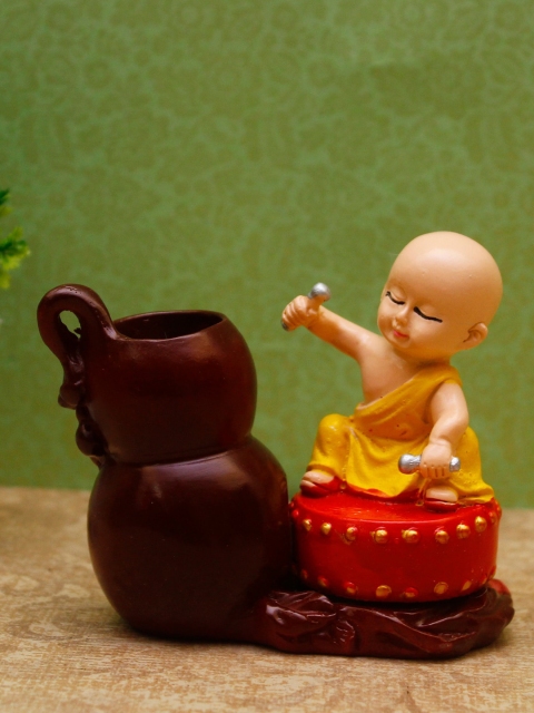 

StatueStudio Yellow & Brown Baby Buddha Monk Statue Showpiece
