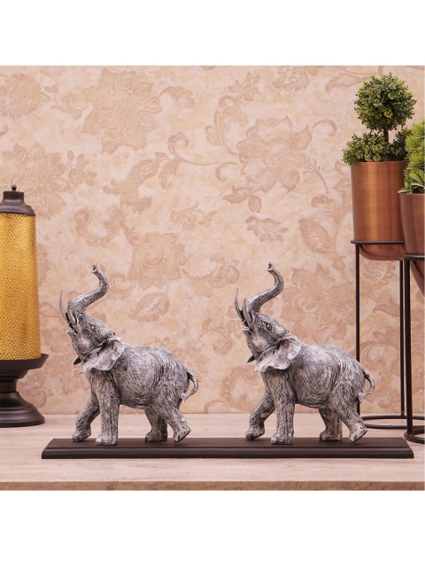 

StatueStudio Rust-Brown Two Walking Elephant Showpiece