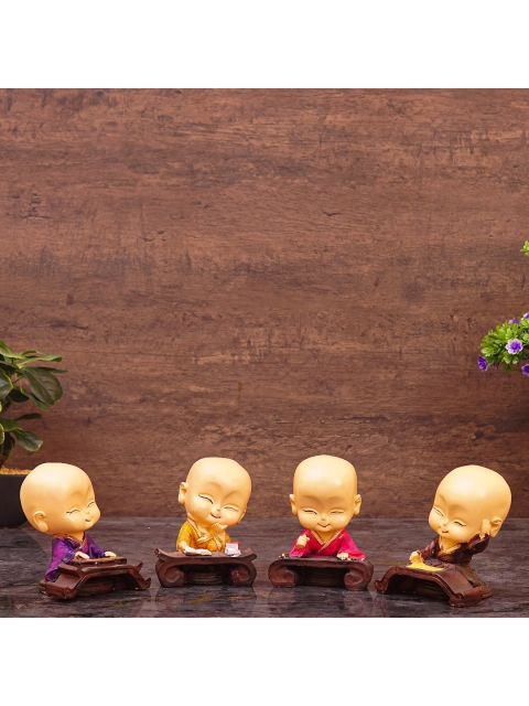 

StatueStudio Set Of 4 Gold-Toned & Purple Buddha Monk Set Showpieces