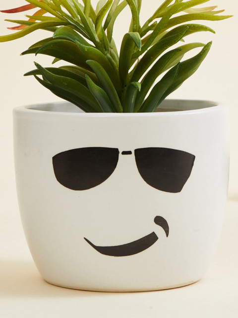 

Home Centre White Malta Printed Sunglasses Ceramic Planter
