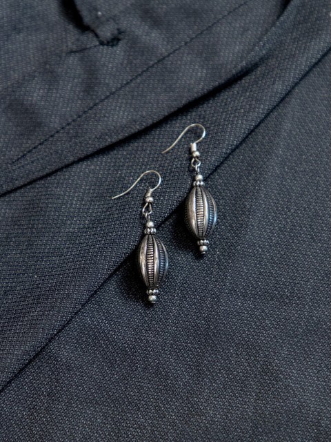 

creyons by mansi Silver-Toned Oval Drop Earrings
