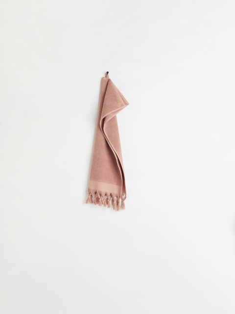 

H&M Pink Solid Cotton Tasselled Hand Towel
