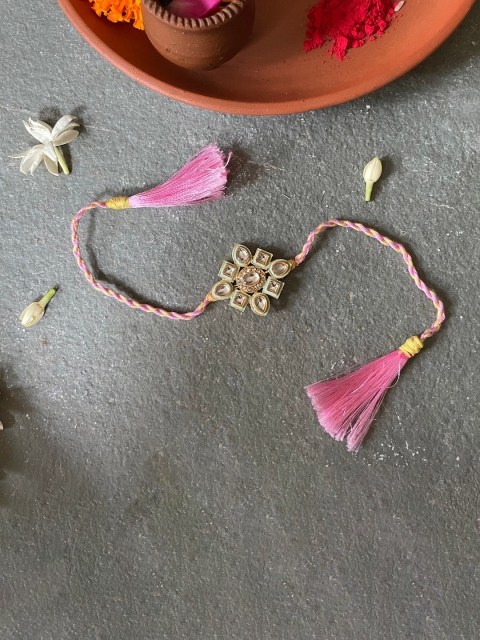

Mitali Jain Golden and Pink Kundan Studded Rakhi