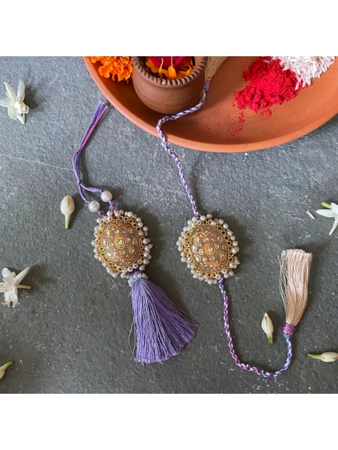 

Mitali Jain White & Lavender Kundan Pearl Rakhi Lumba Set