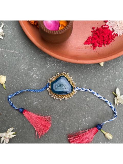

Mitali Jain Blue Agate Pearl Rakhi