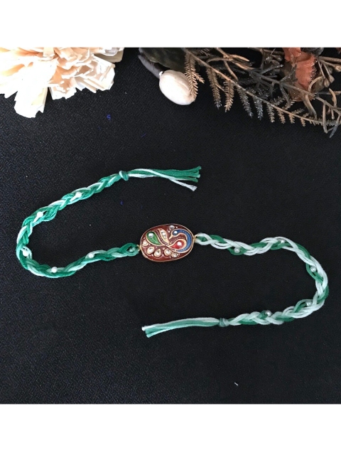 

Mitali Jain Green & Purple Tanjore Rakhi