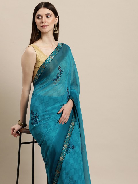 

Triveni Blue Printed Pure Georgette Saree