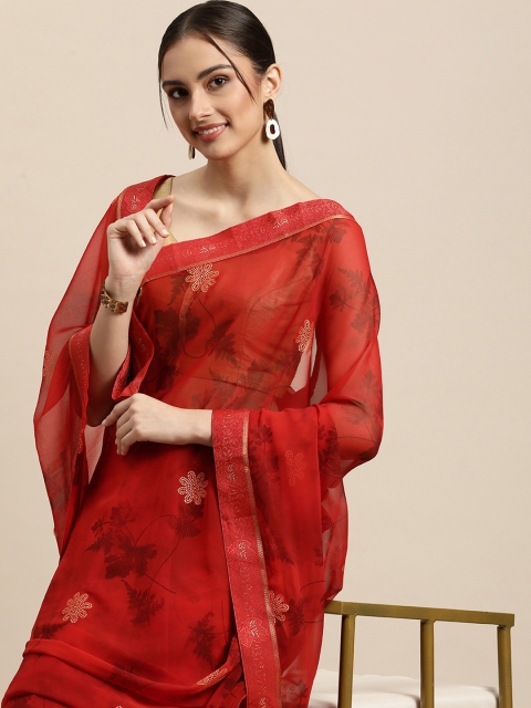 

Triveni Maroon & Gold Floral Zari Pure Georgette Celebrity Saree