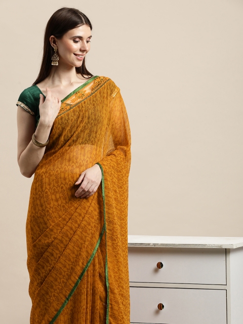 

Triveni Mustard Ethnic Motifs Pure Georgette Saree