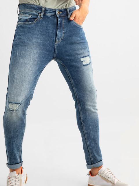 

Snitch Men Blue Skinny Fit Mildly Distressed Heavy Fade Stretchable Jeans