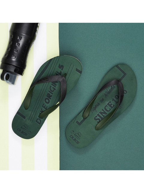 

Duke Men Olive Green & Black Printed Rubber Slip-On