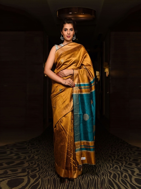 

BEATITUDE Mustard Yellow & Blue Ethnic Motifs Zari Dupion Raw Silk Saree
