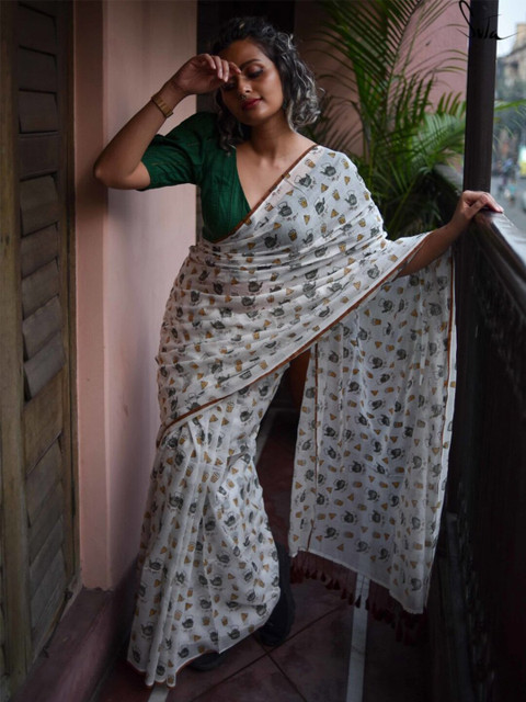 

Suta Women White printed Saree With Fall