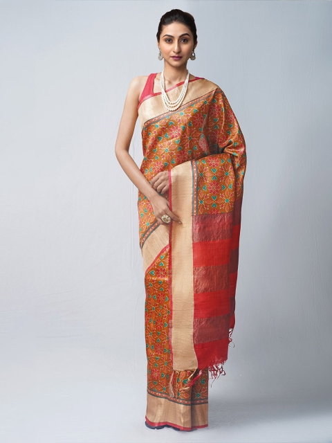 

Unnati Silks Rust & Blue Floral Zari Pure Silk Tussar Saree