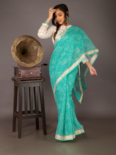 

Unnati Silks Green & Silver-Toned Ethnic Motifs Silk Cotton Chanderi Saree