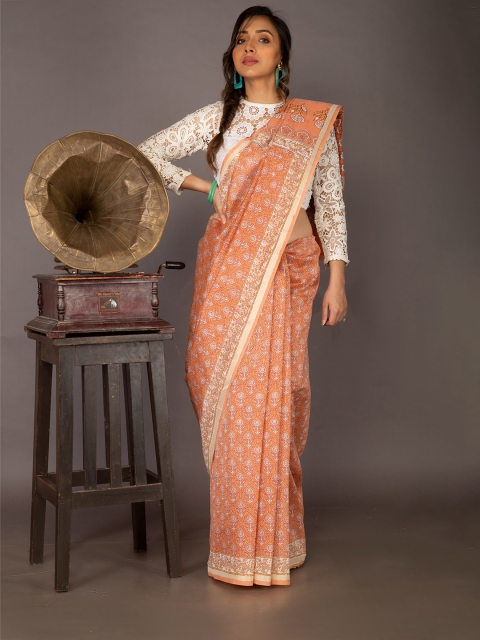 

Unnati Silks Orange & White Ethnic Motifs Printed Silk Cotton Chanderi Saree