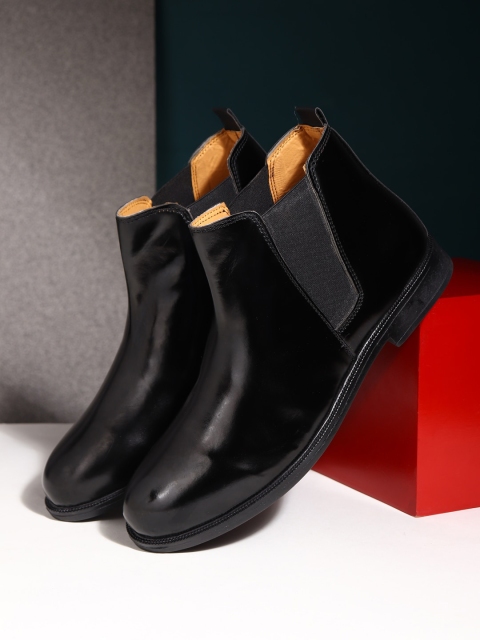 

Apsis Men Black Solid Round Toe Mid-Top Chelsea Boot