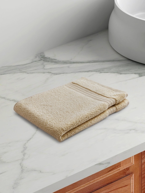 

Living scapes by Pantaloons Beige Solid 550 GSM Cotton Hand Towels