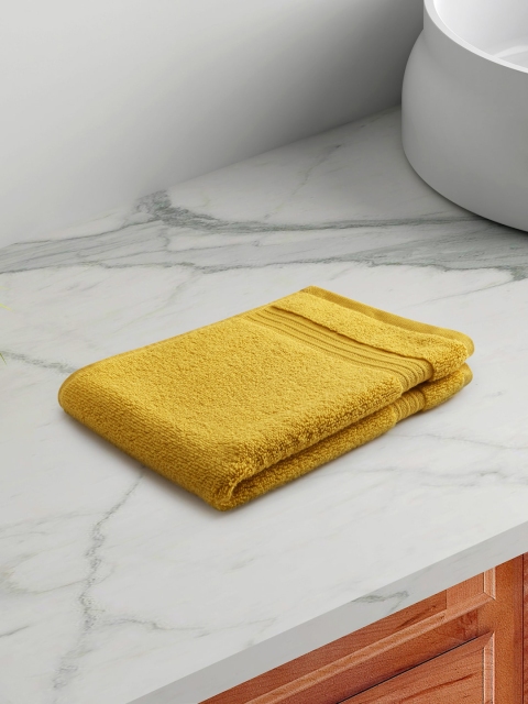 

Living scapes by Pantaloons Mustard Yellow Solid Pure Cotton 550 GSM Hand Towels