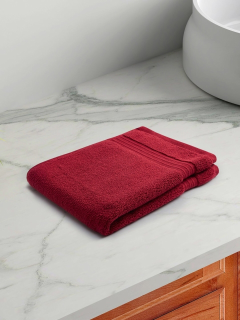 

Living scapes by Pantaloons Maroon Solid 550 GSM Pure Cotton Hand Towel