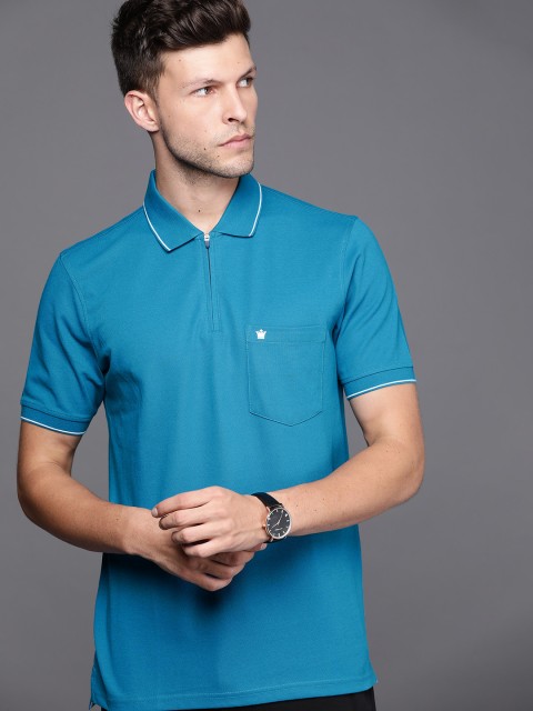 

Louis Philippe Men Blue Solid Polo Collar Golf T-shirt