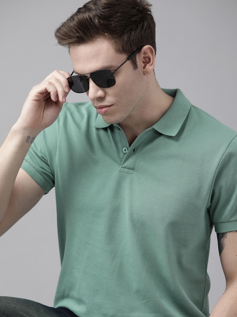 

Roadster Men Green Pure Cotton Solid Polo Collar T-shirt