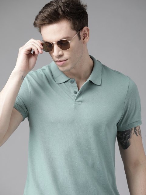 

Roadster Men Green Pure Cotton Solid Polo Collar T-shirt