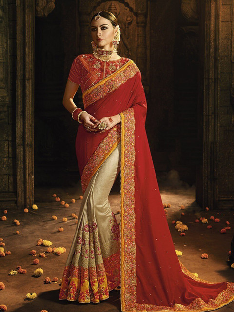 

SHAVYA Orange & Brown Embroidered Beads and Stones Pure Georgette Heavy Work Saree