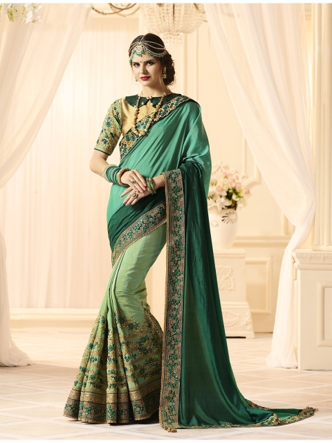 

SHAVYA Green Embellished Beads and Stones Pure Georgette Heavy Work Saree