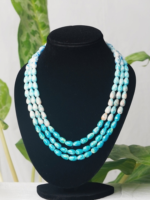 

Unnati Silks Turquoise Blue & White Beaded Layered Necklace