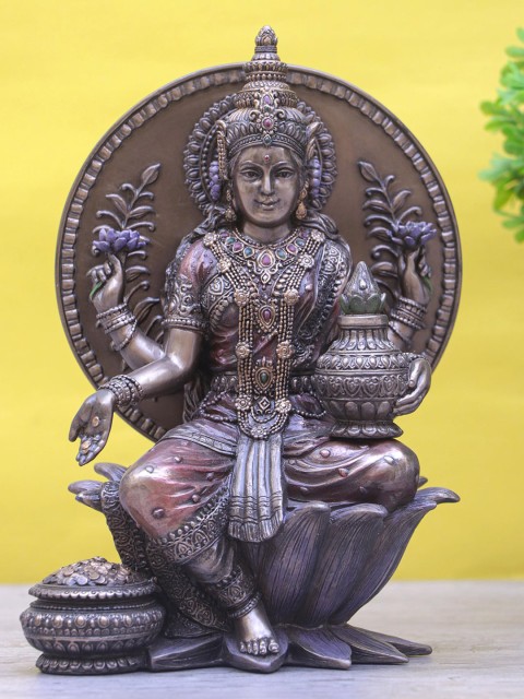 

StatueStudio Gold-Toned Lakshmi Idol With Money Pot Showpieces