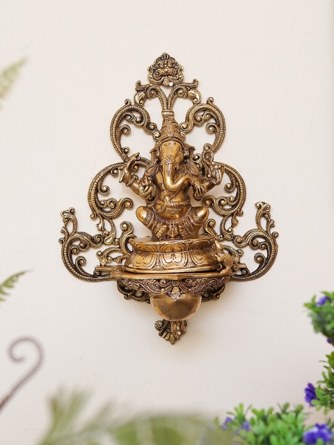 

StatueStudio Gold-Toned Lord Ganesha Wall Hanging Diya