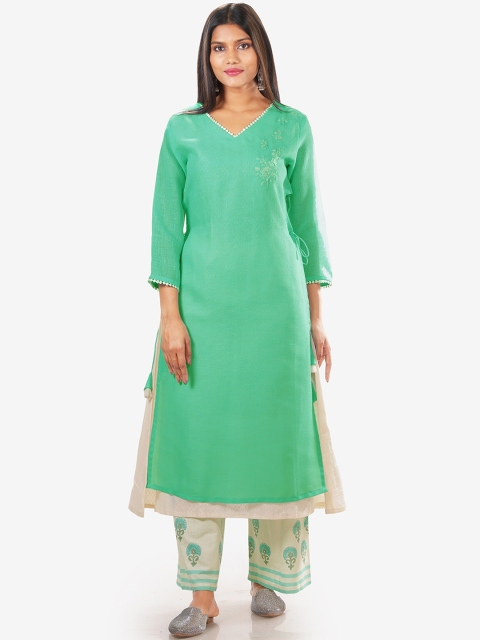 

Jansi Women Sea Green Regular Linen Kurti with Palazzos