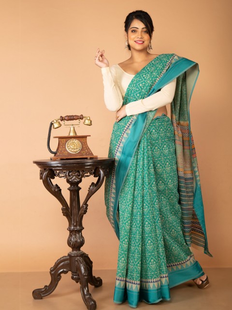 

Unnati Silks Green & White Ethnic Motifs Silk Cotton Chanderi Saree