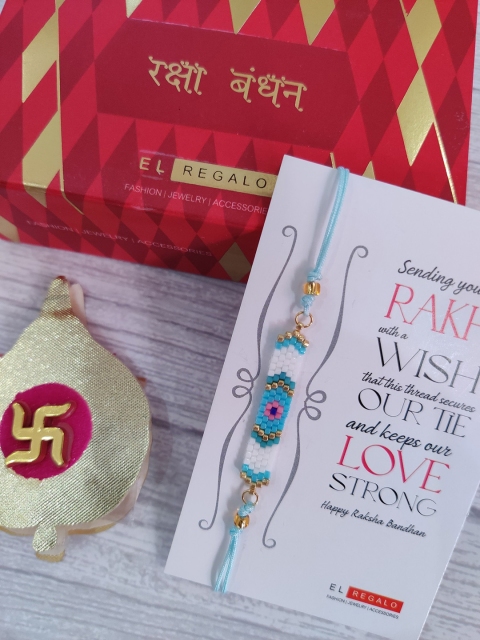 

EL REGALO Blue Miyuki Beaded Evil Eye Rakshabandhan Combo with Greeting Card Roli Chawal