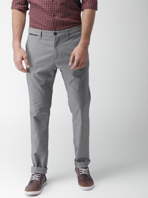 

Tommy Hilfiger Men Blue Straight Fit Solid Casual Trousers