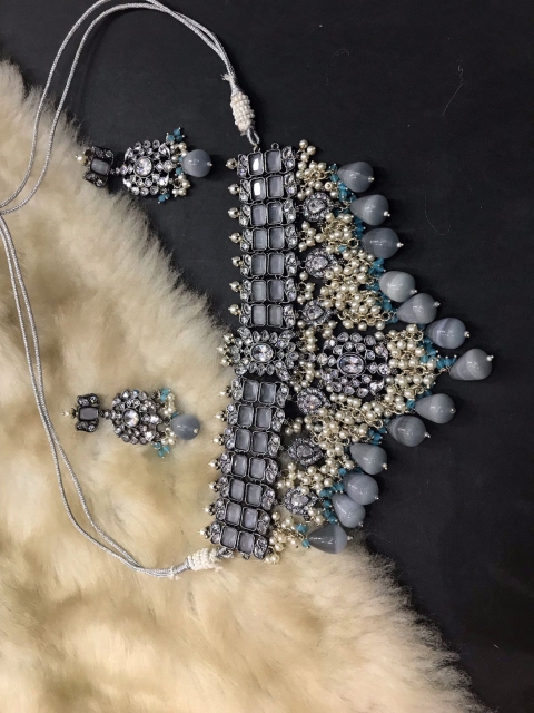 

SURYAM DESIGNER JEWELLERY Gold-Plated Grey Stone-Studded Jewellery Set