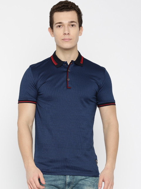 

Status Quo Men Blue Solid Polo Collar T-shirt
