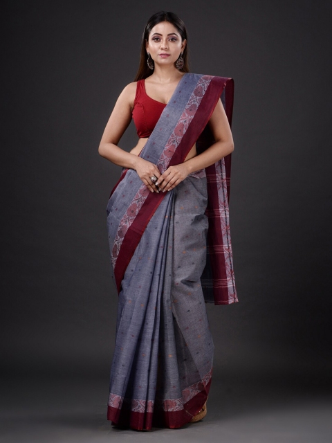 

Mitera Grey & Purple Ethnic Motifs Pure Cotton Saree