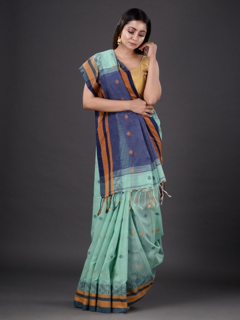 

Mitera Sea Green & Orange Floral Zari Silk Cotton Heavy Work Saree