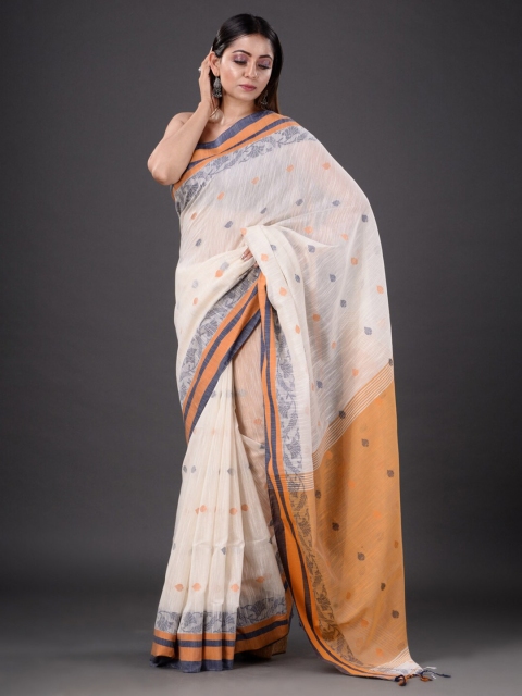 

Mitera Off White & Orange Ethnic Motifs Silk Cotton Heavy Work Saree