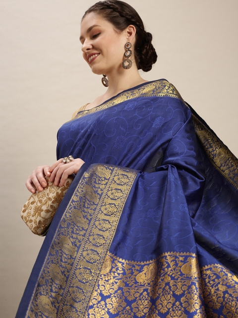 

Rudra Fashion Blue & Gold Ethnic Motifs Silk Blend Banarasi Saree