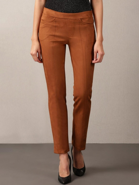 

Lakshita Women Beige Solid Jeggings