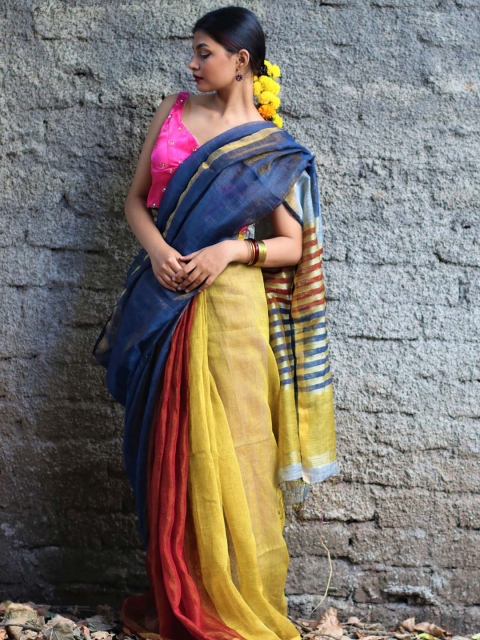 

Chidiyaa Blue & Yellow Colourblocked Pure Linen Saree